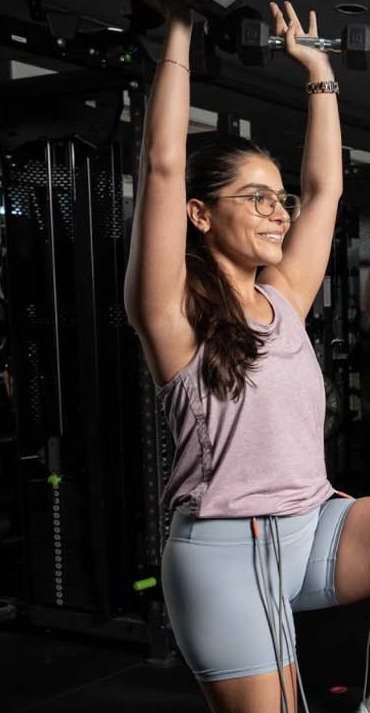 A woman during a private one-on-one Neubie glute session in the studio
